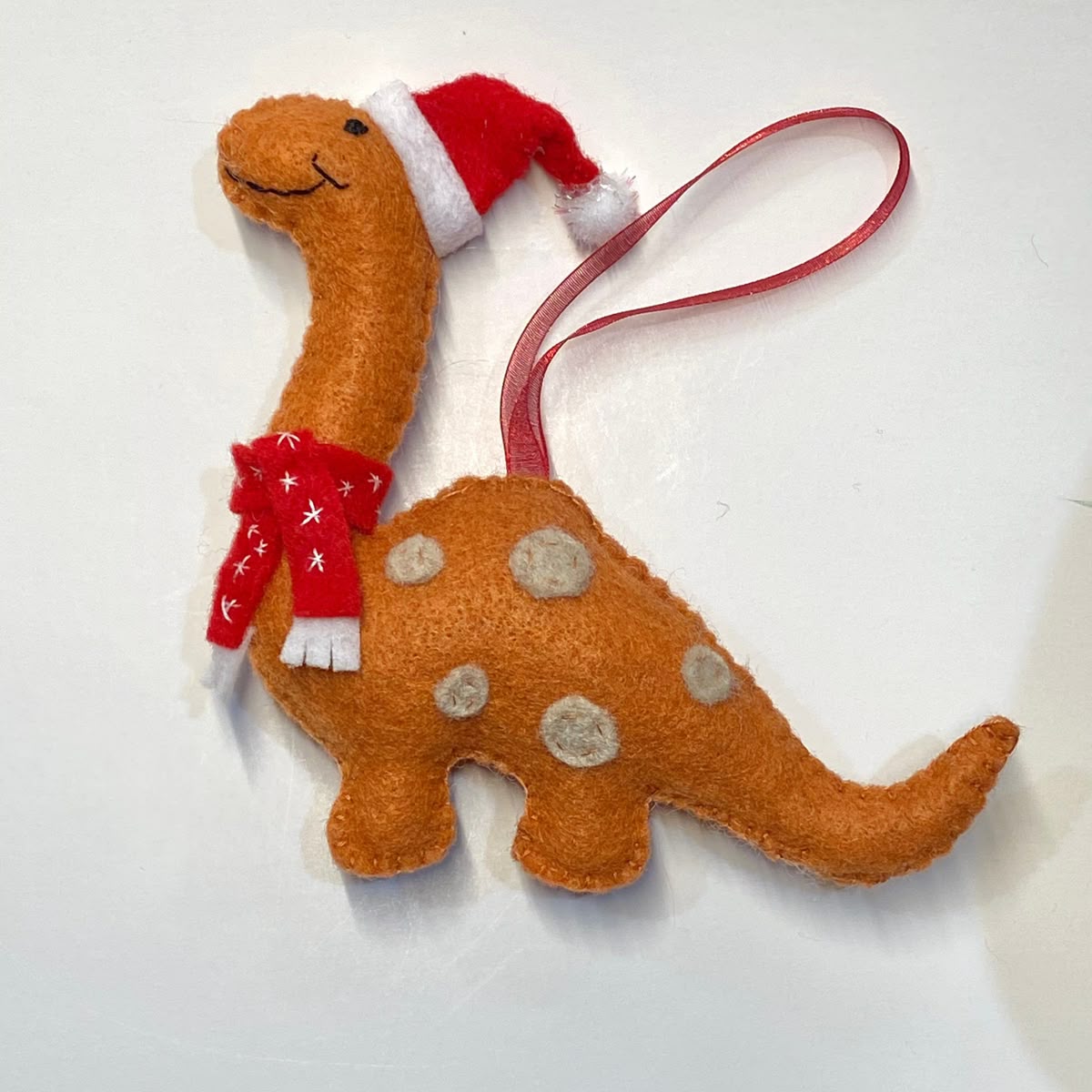 Handcrafted Christmas Orange Dinosaur Felt Ornament | Cute Festive Brontosaurus with Santa Hat &amp; Scarf | Whimsical Holiday Tree Hanging Decor